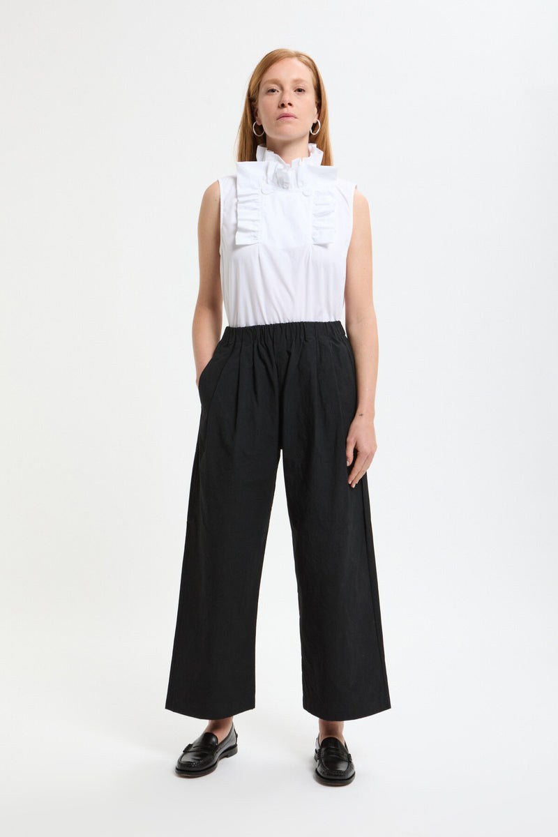 Pantaloni a due pieghe