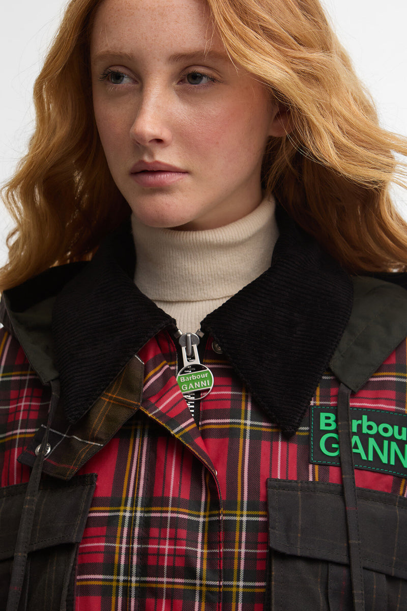 Giacca cerata con peplo e dettagli in tartan Barbour x GANNI